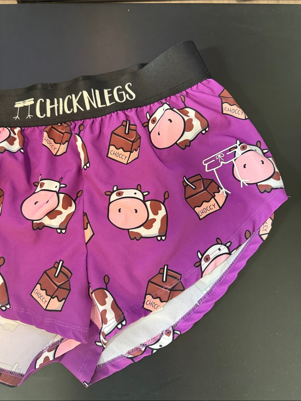Chicknlegs Women's Purple Cow Print Athletic Shorts - Picture 4 of 9